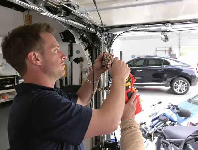 Montebello Garage Door Repair safety certified technician performing cable replacement in Montebello