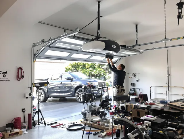Montebello Garage Door Repair specialist installing smart garage door opener system in Montebello home