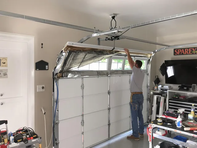 Garage door section replacement by Montebello Garage Door Repair in Montebello